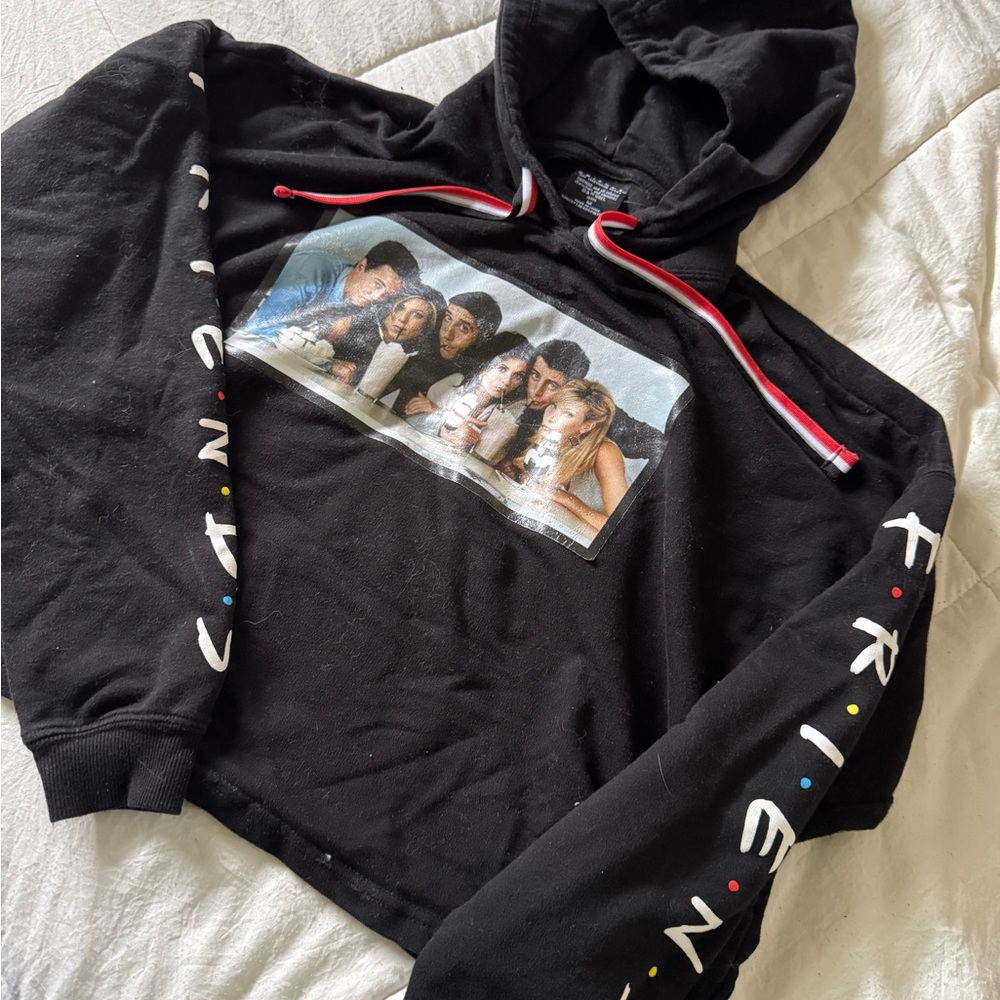 Black Hoodie with Red Accents and Graphic Patch